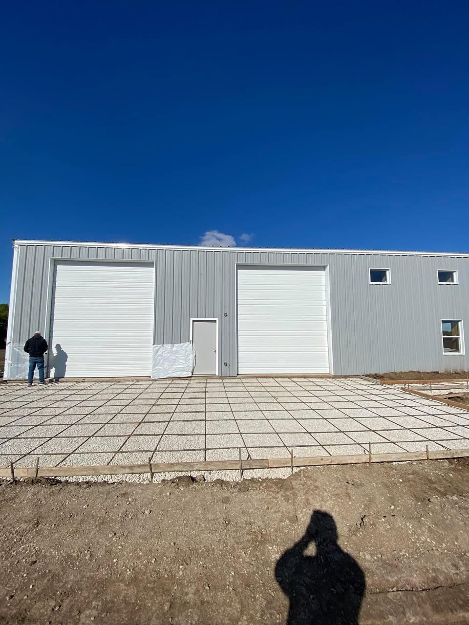 Commercial sectional doors on a steel building